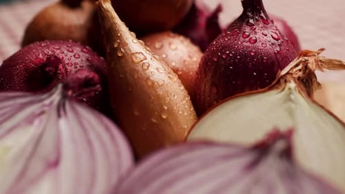 Close Up of Onion Halves on Wooden Board Handheld Camera