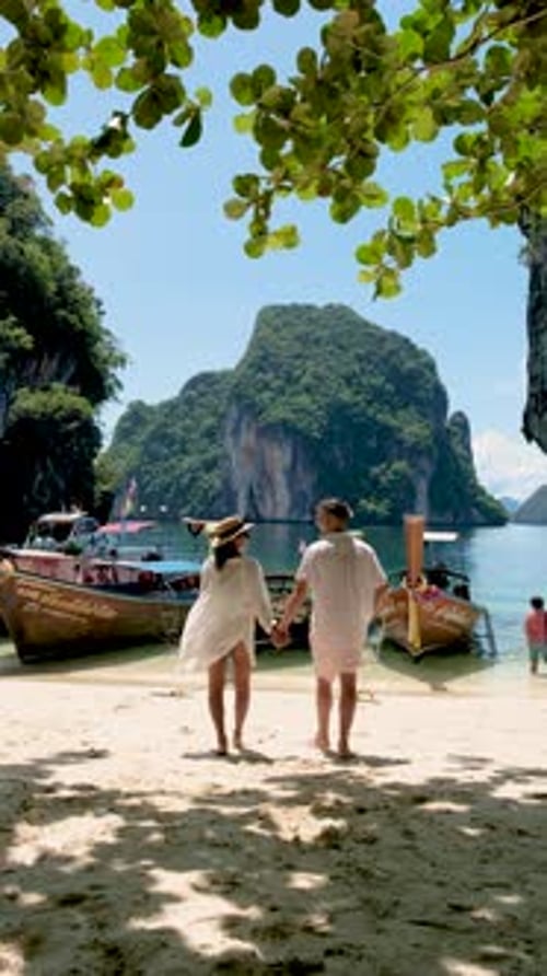 Couple Men and Women on a Tropical White Beach in Thailand Koh Hong Island Krabi