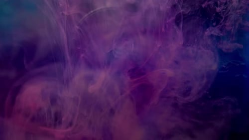 Abstract Footage of Ink Swirling in Liquid