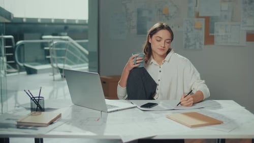 A Female Architect Creates Innovative Designs Using Advanced Technologies