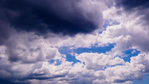 Cumulus Clouds Move in the Blue Sky Timelapse