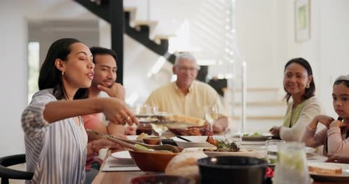Family Enjoys Meal Together at Bright Home