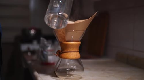 Pouring Water into Pour Over Coffee Maker