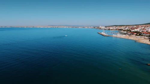 Footage above the blue waterscape of the Black Sea along the beautiful shore.