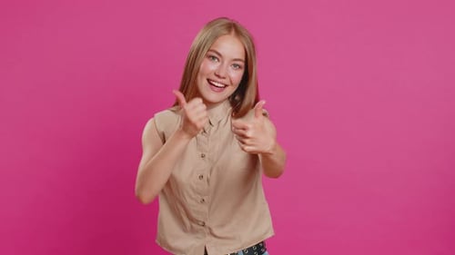 Young Woman Giving a Double Thumbs Up