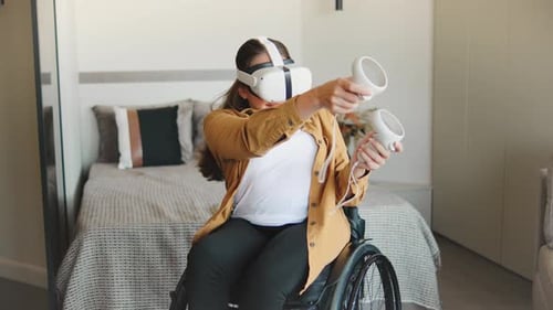 Woman in Wheelchair Using Virtual Reality Headset Indoors