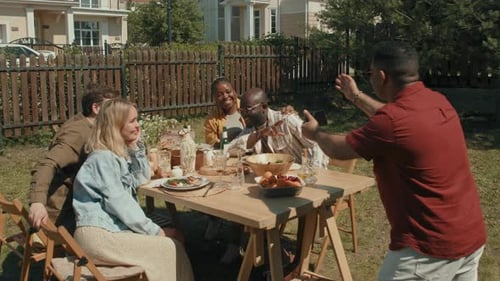 Taking Group Photo Of Friends