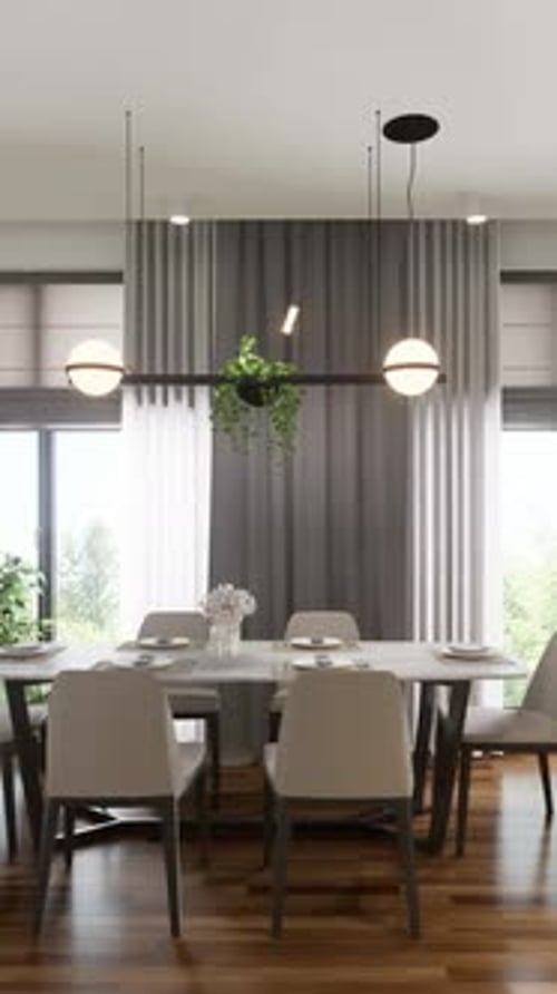 The interior of a studio apartment with an open space for a TV area, a dining room and a kitchen