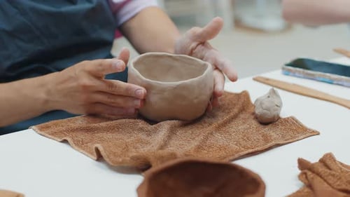 Person Works with the Clay in the Pottery Workshop During Masterclass