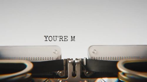 Old mechanical typewriter typing You're My Favorite Person in a close-up view.
