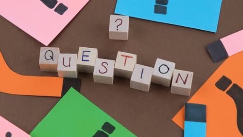 Wooden Blocks Spelling Question with Colorful Question Marks