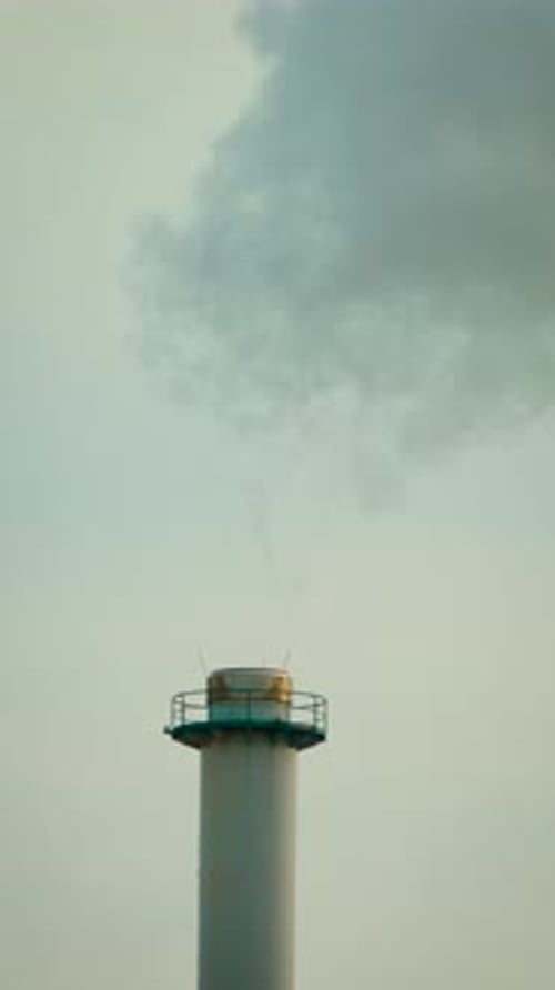 Power Plant Chimney Emitting Thick Plume of Smoke Industrial Air Contamination and Ecological Damage