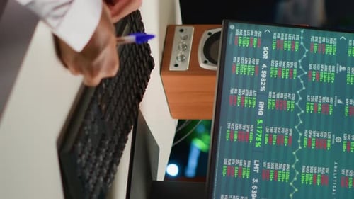 Working on Computer with Financial Data