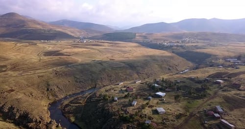 Landscape, village and river in countryside from drone with natural environment