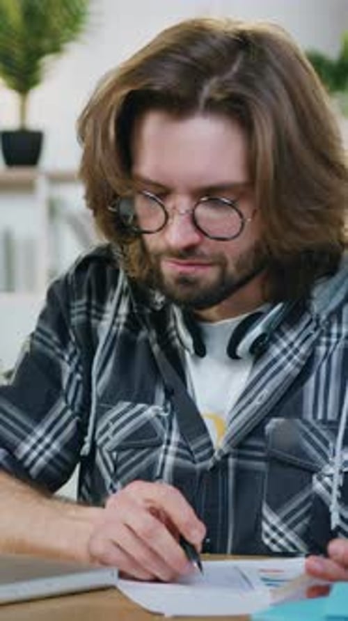 Business Concept Where Goodlooking Businessman in Casual Clothes Working at Home Office on Laptop