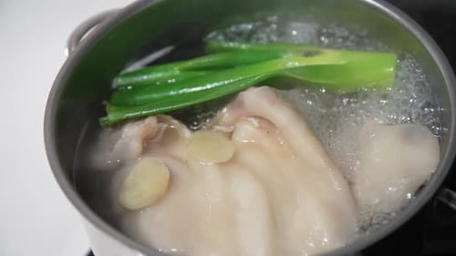 Boiling pig ears