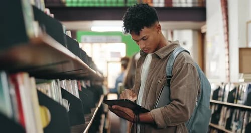 College, African man and book with tablet in campus library for fact check study or online course