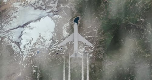 Modern Jet Aircraft Flying Over Snowy Mountains