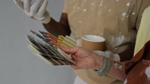 People Selecting Paint Color for Home Improvement