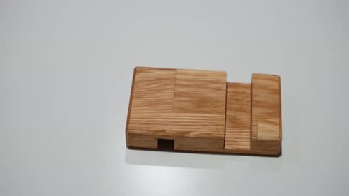Handmade Wooden Phone Stand a Phone Holder on White Background