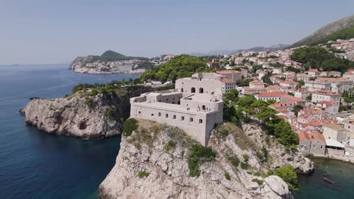 Croatia Aerial: Fort Lovrijenac, Dubrovnik, with ocean and rugged coastline