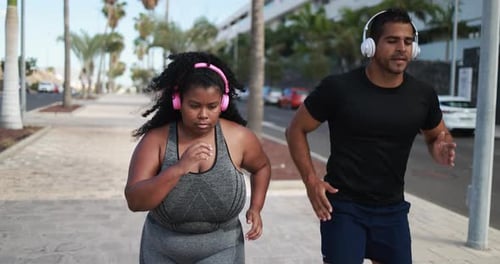 Curvy Woman Running Outdoor With Her Pesonal Trainer - Plus Size Body, Sport And Healthy Lifestyle