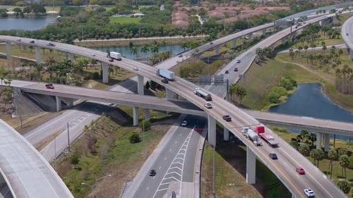 Highway Interchange in Miami City with the Fastmoving Vehicles Showing US Transportation