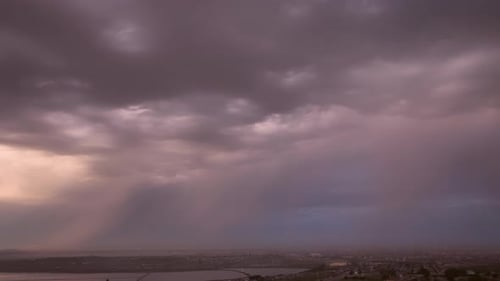 Timelapse of dramatic clouds seen over city