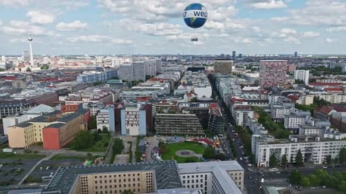 Aerial view revealing The Berlin Weltballon in Berlin city centre on a sunny day