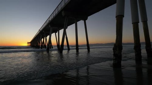Sunset over the Ocean with a Pier