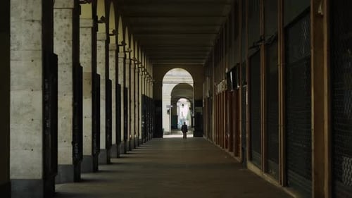 Mysterious man in the alley. Torino, Italy. Symmetry.