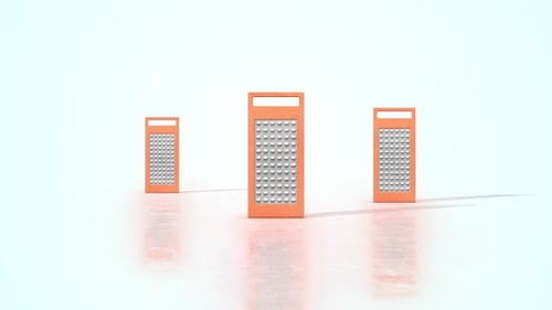 Modern Orange Kitchen Graters on Reflective Surface