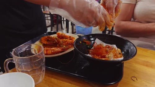 Preparing Spicy Shrimp for Eating in Restaurant