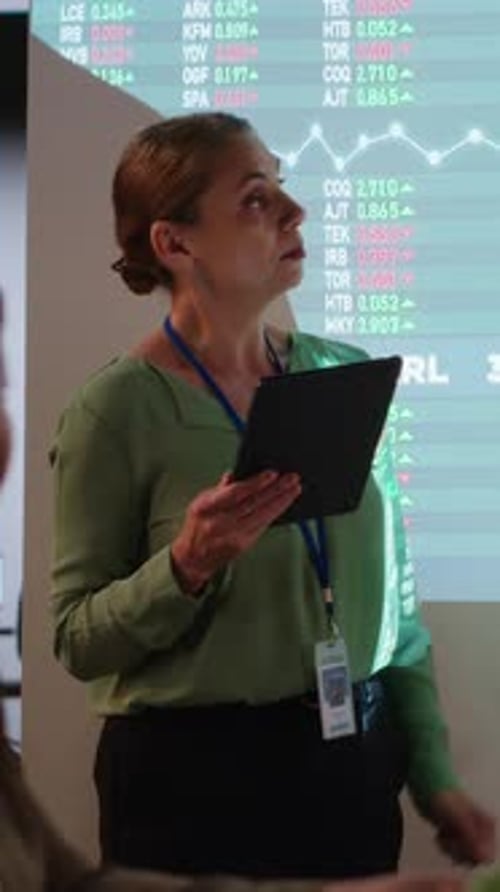 Vertical Video Corporate Employees Exchanging Project Details and Essential Information