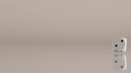 White Dice Rolling in Slow Motion on Surface