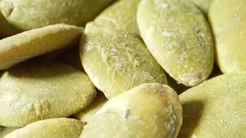 Intricate macro view of pumpkin kernels.