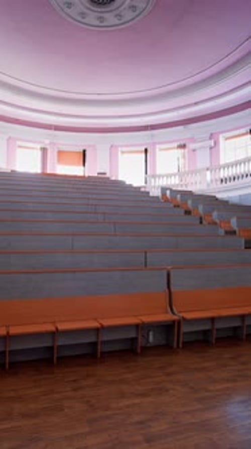An empty lecture hall in a University. Interior of contemporary lecture theater in university campus