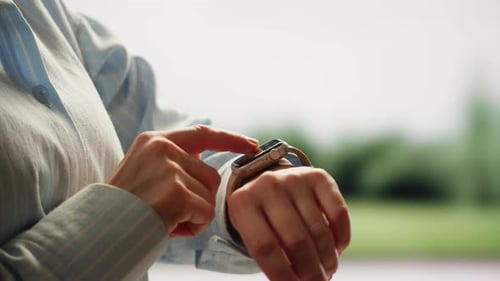 Smart Watch Using in Office Successful Asian Businessman Use Smartwatch at Workplace Man Chooses