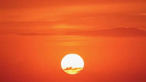 Nature’s twilight painted the skyline with shades of red and orange, time lapse
