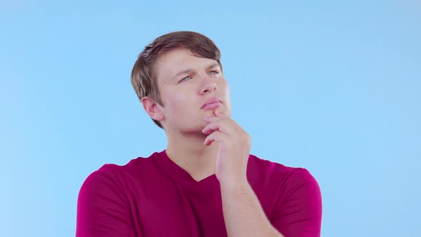 Thinking, wonder and man with an idea in studio with a planning ...