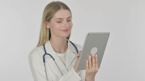 Woman Doctor Using Tablet in Hospital Setting