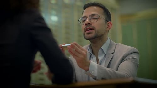 Two Professionals in Thought in the Vault Room