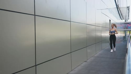 Young Woman Athlete Performs Exercise Sport Lifestyle Training Jogging City Street Healthy Female