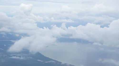 nature sky from airplane with clouds outdoor in summer daytime