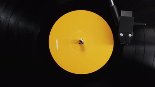 Vinyl Record Spinning on Turntable Close Up