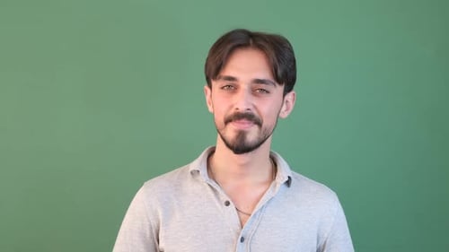 Man Blowing a Kiss with Open Hand Gesture