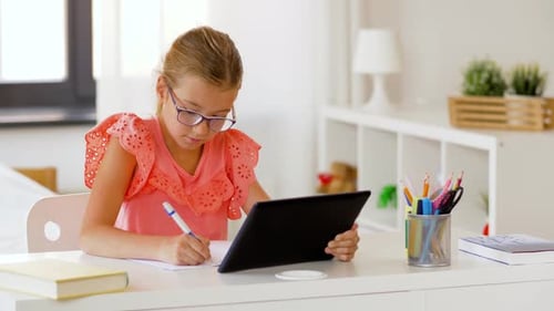 Children, Education And Learning Concept - Student Girl With Tablet Computer Writing To Notebook ...