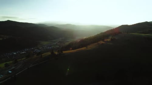 Aerial of Stunning Sunset in the Mountain Area, Village in the Valley