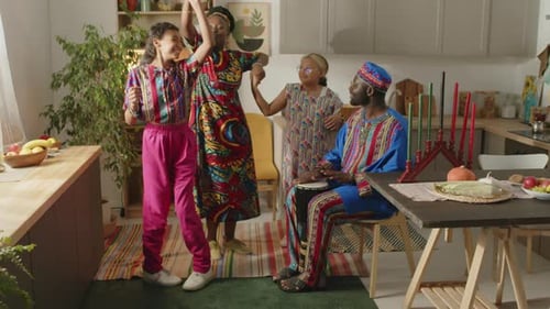 Family Celebrates Kwanzaa with Drumming and Dancing