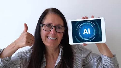 Good use of AI for your business concept. Woman holding up tablet with Artificial Intelligence softw